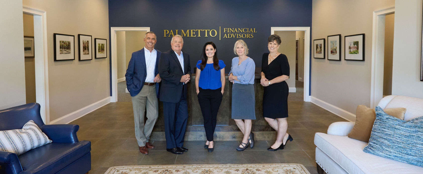 Greg Paschal, Katy Hartnett, Dean Blissit and the leadership team of Palmetto Financial Advisors posing in their offices in Aiken, SC